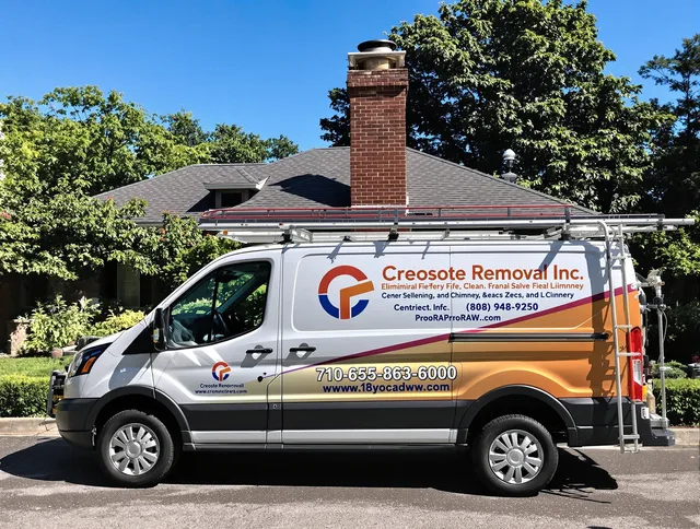 Ipswich Chimney Sweep technician removing creosote safely in Ipswich, MA